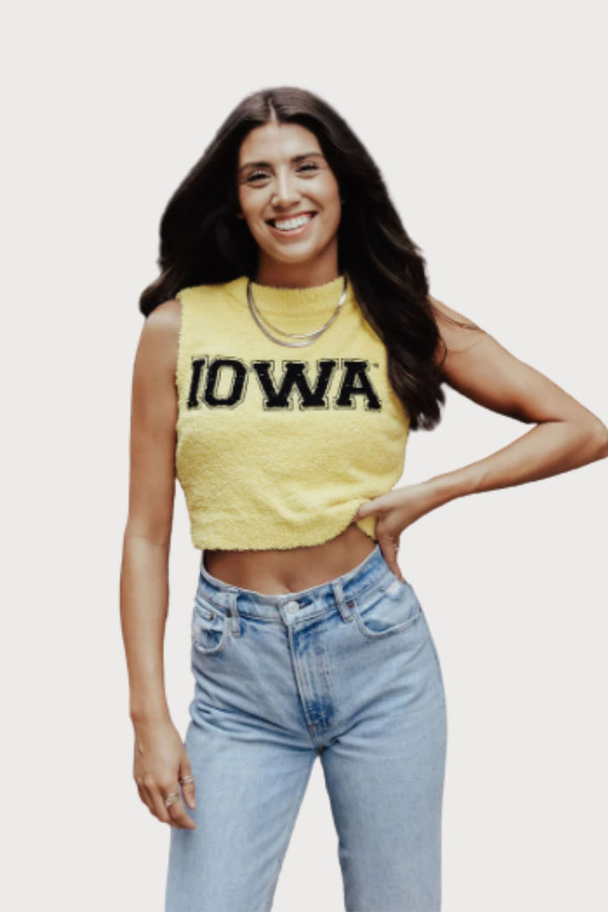 The Iowa Eyelash Crop Sweater Tank is so cute and unique! If you are looking to standout for game day, this style is a must-have. It's soft, bright yellow, with a black "IOWA" text. 