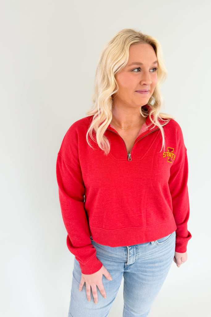 Stay game day ready in this cozy in this Iowa State Red Halftime Quarter Zip, featuring an ultra-soft lining and medium weight fabric! A great look for game days and for Cyclones alumni alike, you will be reaching for this favorite red quarter zip again and again.