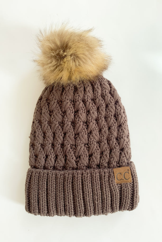 Lattice Crossover Stitch Knit Pom Beanie is ultra cozy with a soft inner lining. The colors are gorgeous, turning cold weather gear into a fashion statement. Choose between several to complete you look! 