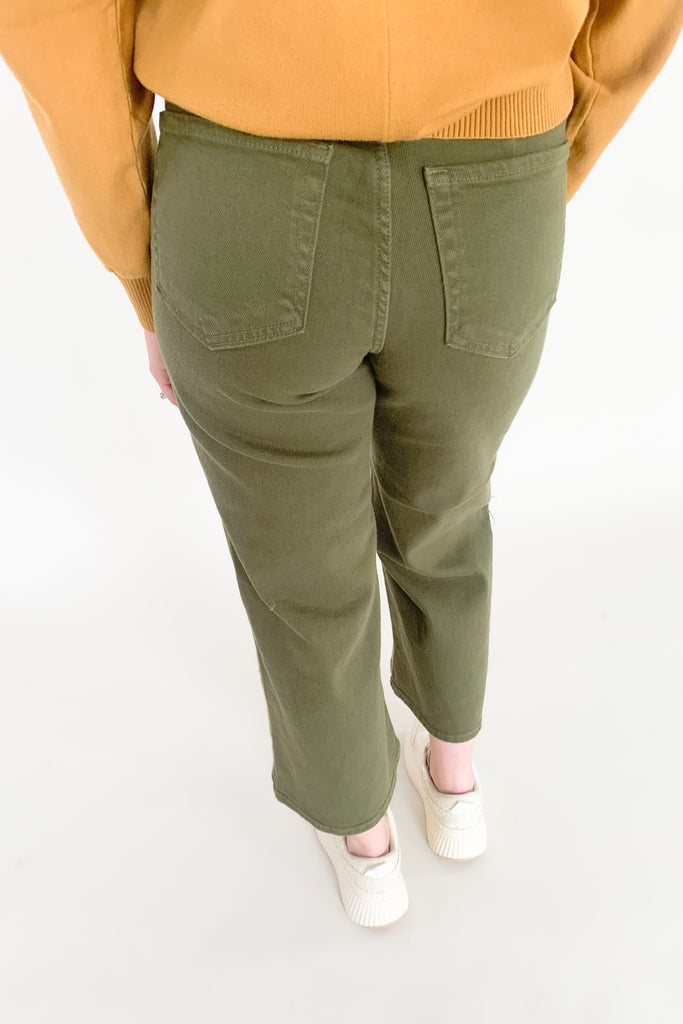 Trousers have taken over! This trending wide leg trouser from Just Black Denim is high-waisting and made with a thick fabric that molds to your body. With a relaxed fit through the knee and a wide open leg, you will be loving the comfort and look of this style! 