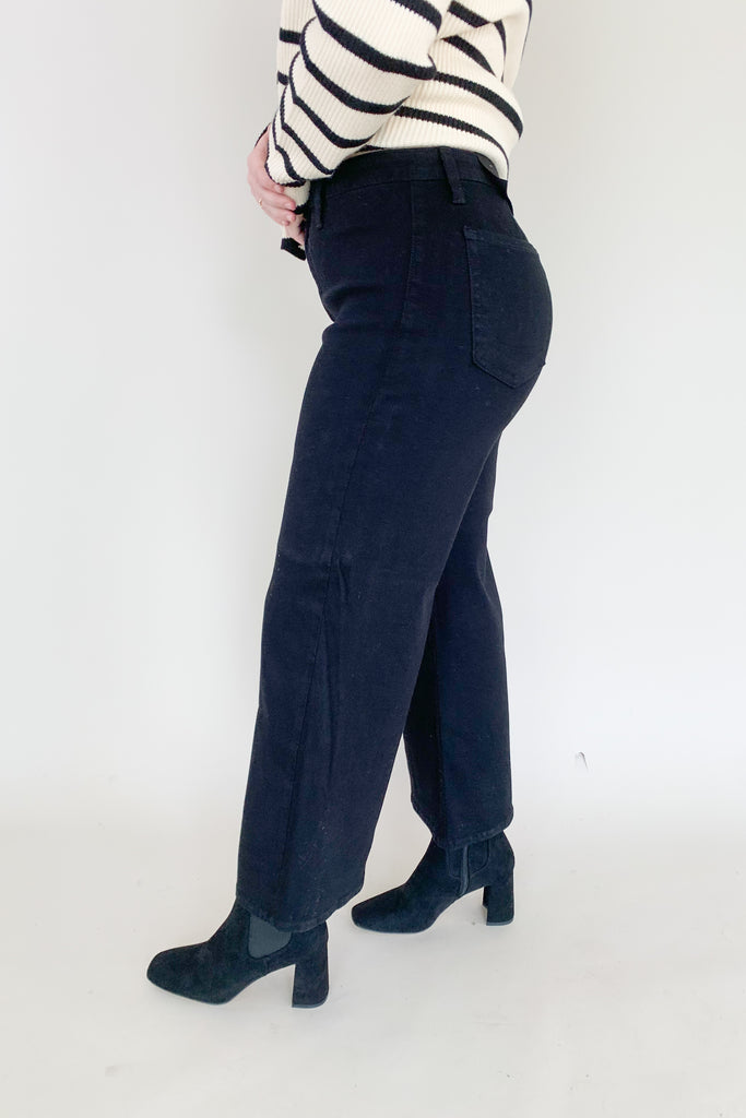 Trousers have taken over! This trending wide leg trouser from Just Black Denim is high-waisting and made with a thick fabric that molds to your body. With a relaxed fit through the knee and a wide open leg, you will be loving the comfort and look of this style! 