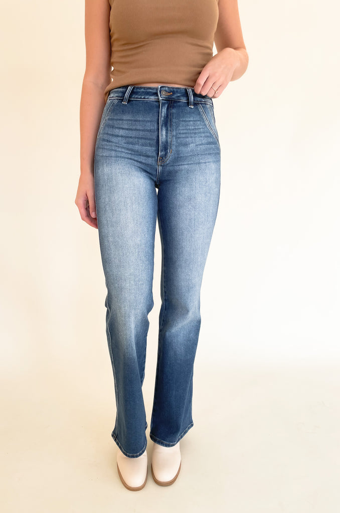 The Dionne Medium Wash High Rise Jeans are so on trend, comfortable, and look amazing on several body types. We know wide leg jeans are a tall girl's go-to, but they look great with so many body types! Pro tip: You can easily trim this style to fit you perfectly! This style is worth it, especially with the unique double pocket look and faded wash. It's elevated and effortlessly cool. 